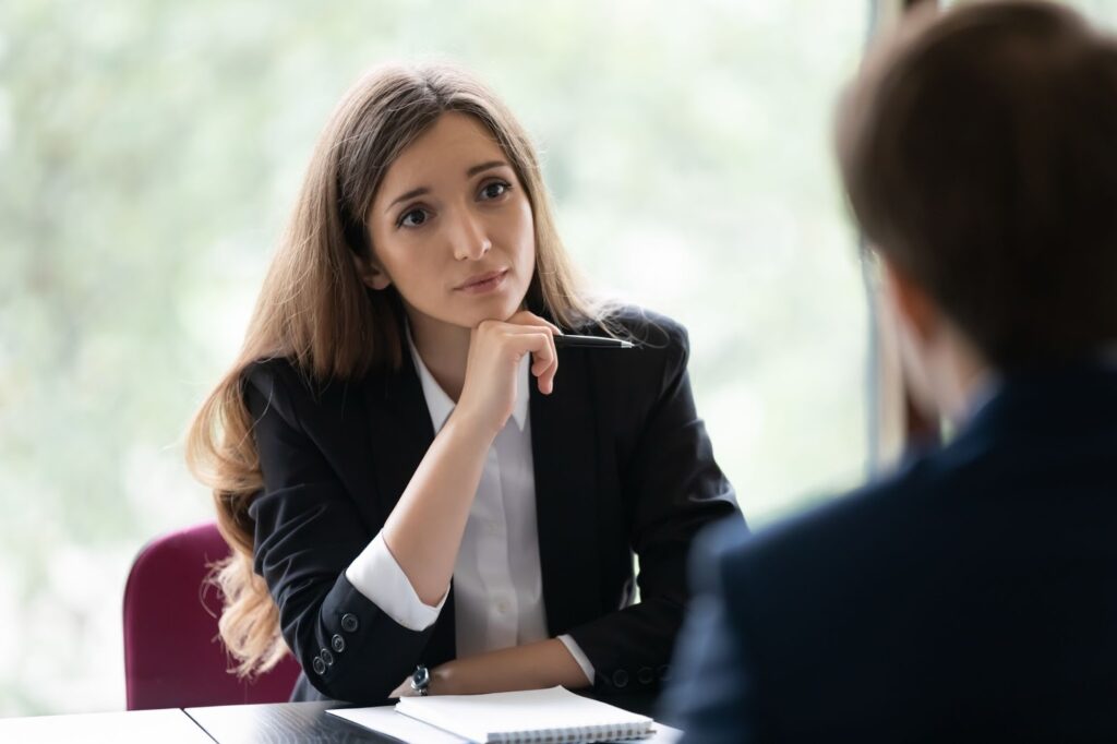 Engaged manager listens to a teammate