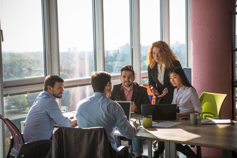 Finance team discussing Why spend visibility is crucial for scaleups