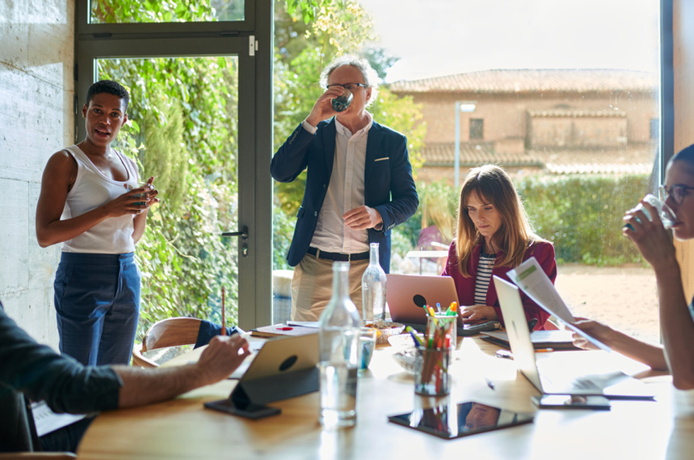 Image of the finance team discussing how to ensure all business expenses have clear audit trail