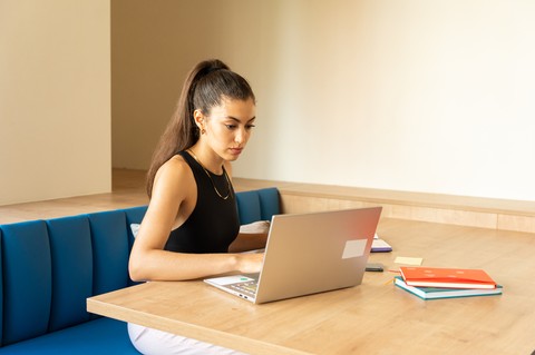 Employee checking the expense management software and the build-in reports