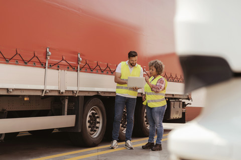 transport and logistics teammates talk expenses