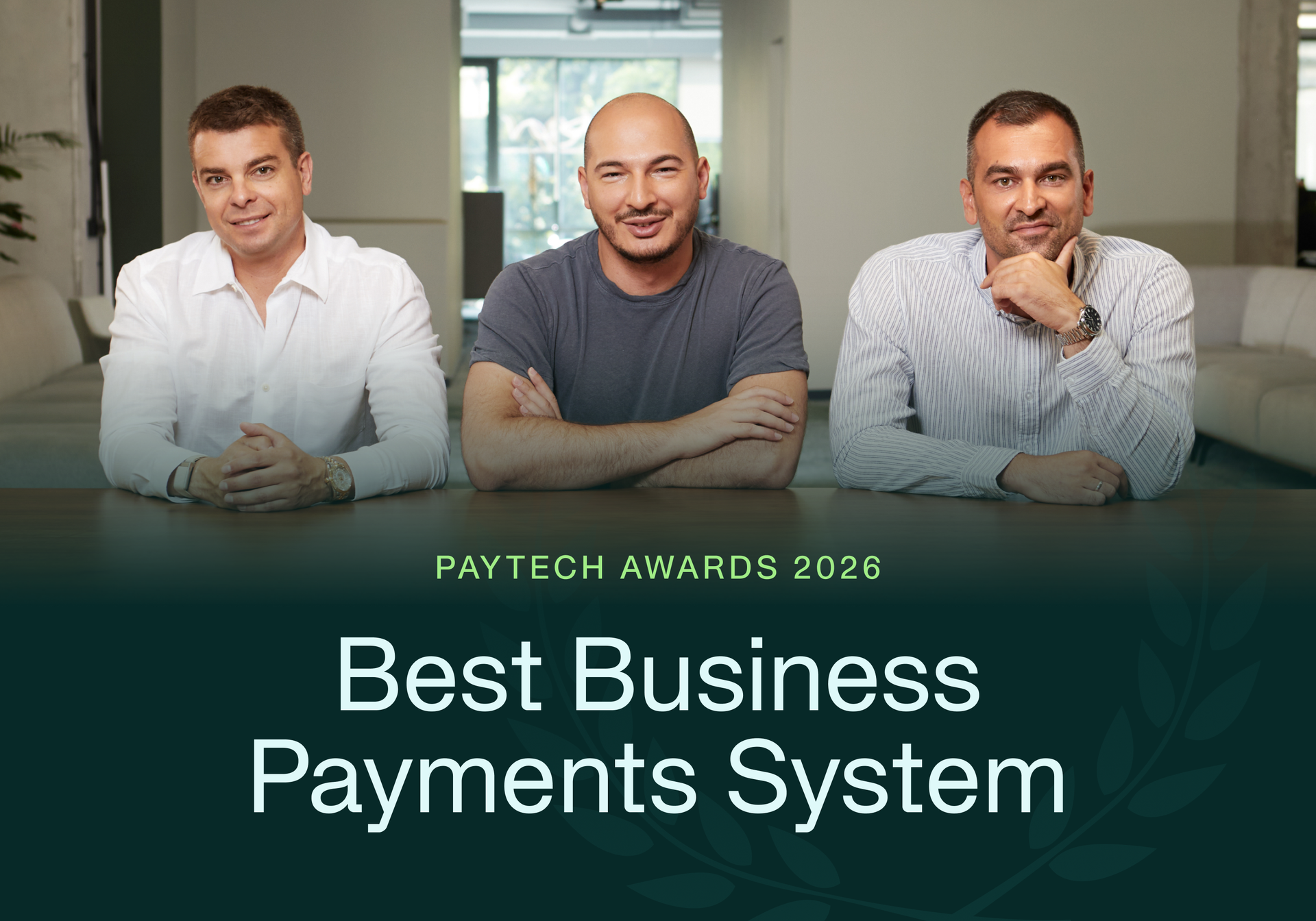 Payhawk founders with the Best Business Payments System award at the PayTech Awards 2026