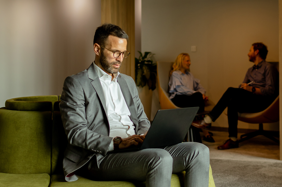 CFO looking at his laptop
