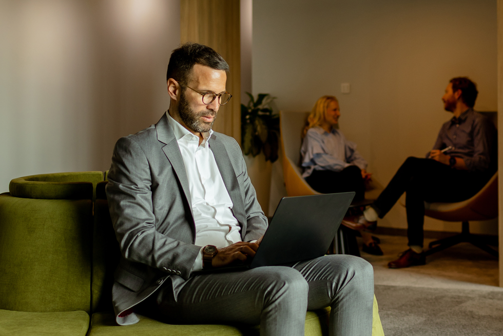CFO looking at his laptop
