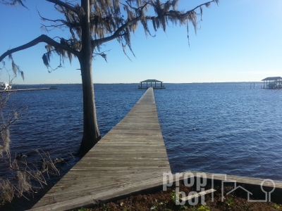 Vacant Half Acre River Ac