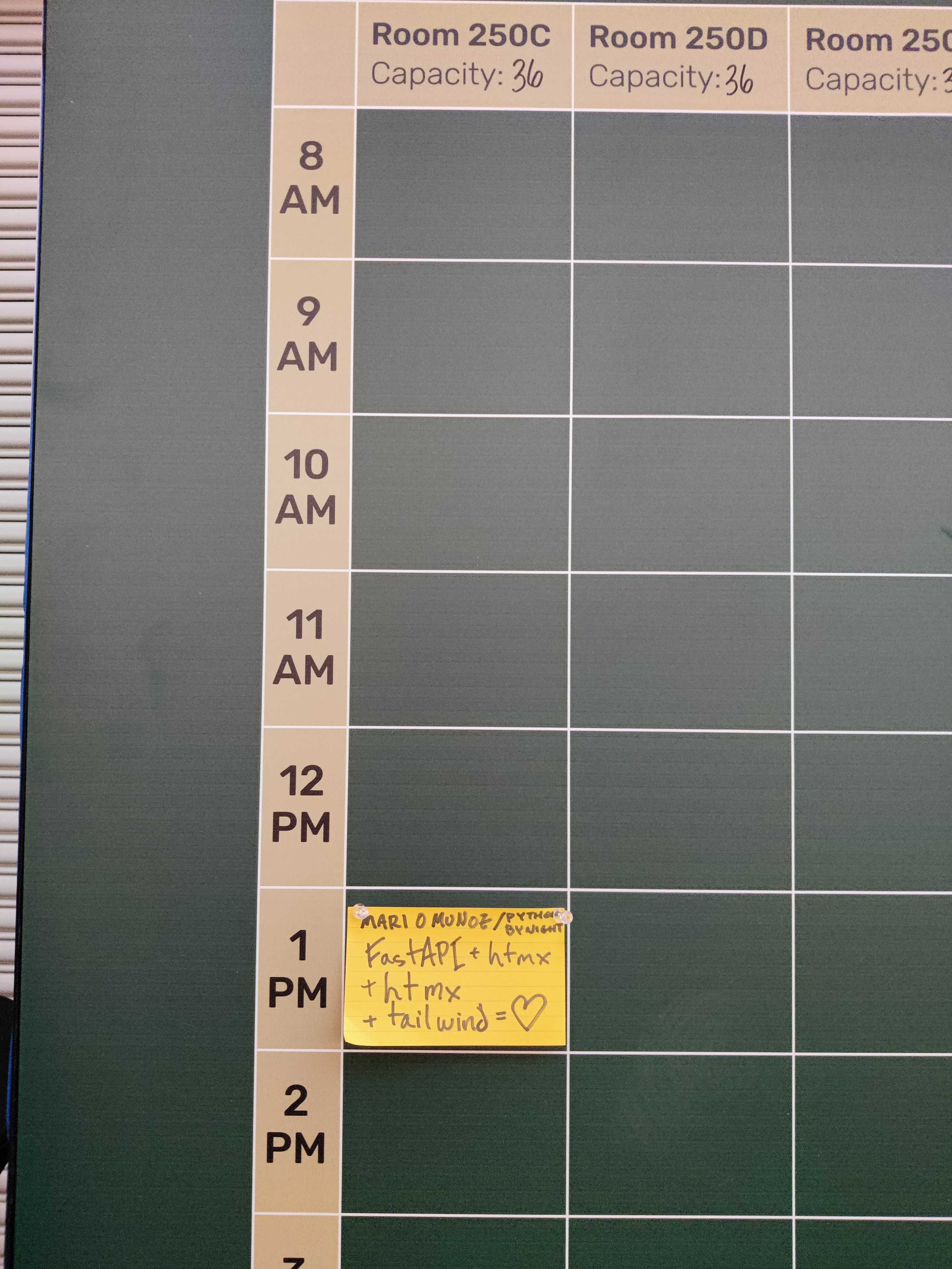 Open space board at PyCon promoting FastAPI+htmx+tailwind