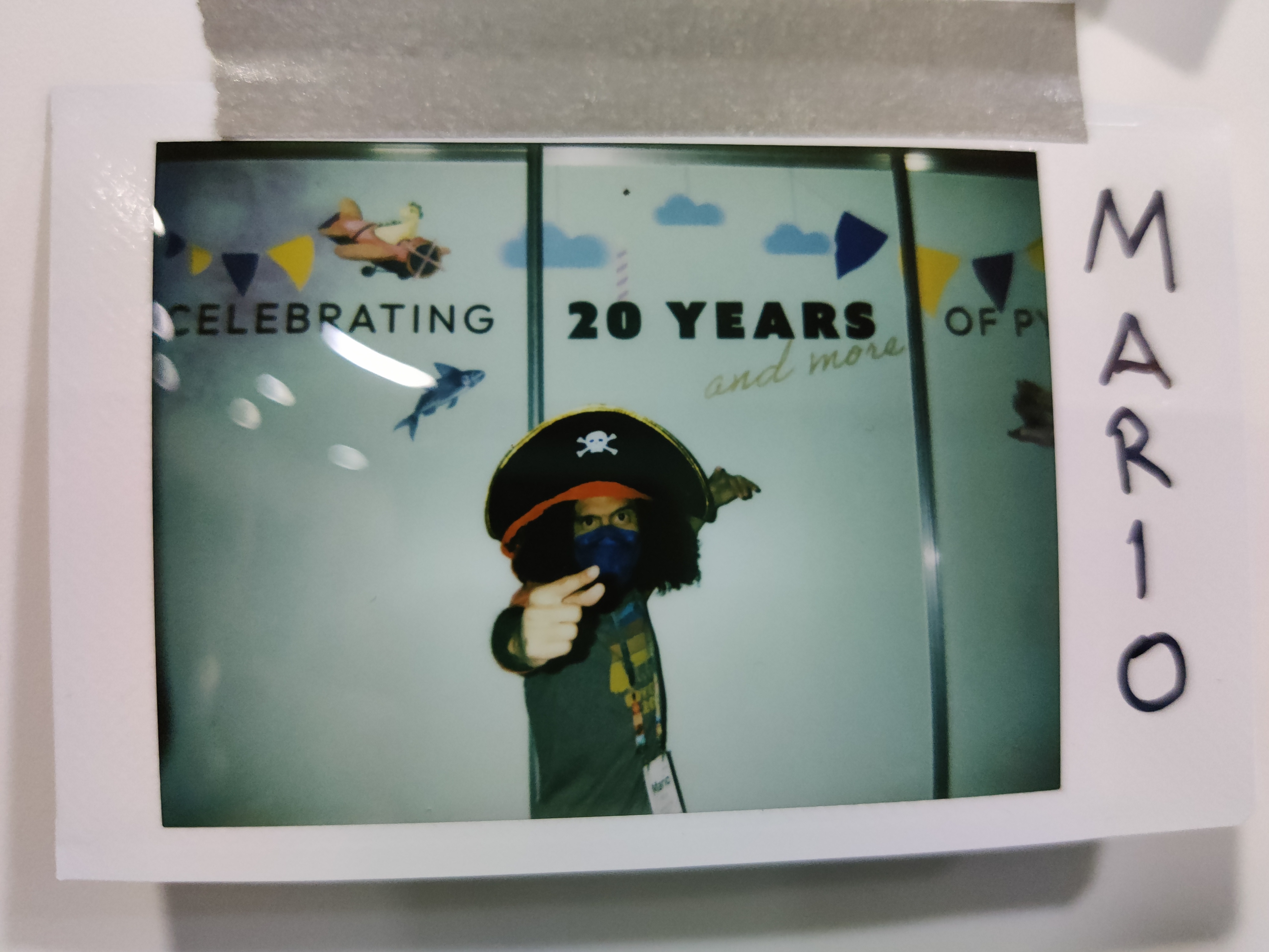 Polaroid of myself posing as a pirate in front of PSF booth