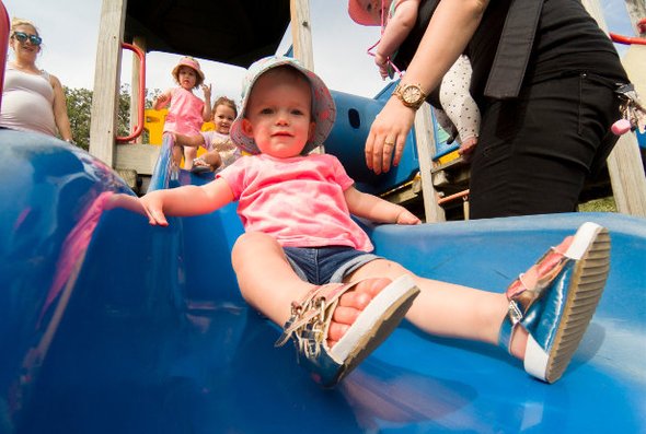 hero image - baby on slide at playground