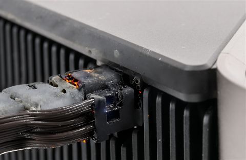 hot_wire_melted_connector_on_fire_power_cable_flames-1981341194-scale32.00-k_euler_a