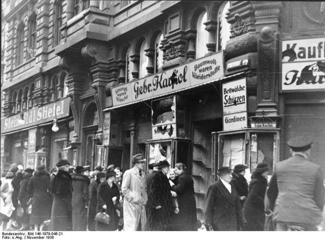 "Bundesarchiv Bild 146-1979-046-21, Magdeburg, zerstörtes jüdisches Geschäft" by Unknown German Federal Archive (Deutsches Bundesarchiv) as part of a cooperation project. Licensed under CC-BY-SA-3.0-de via Wikimedia Commons.