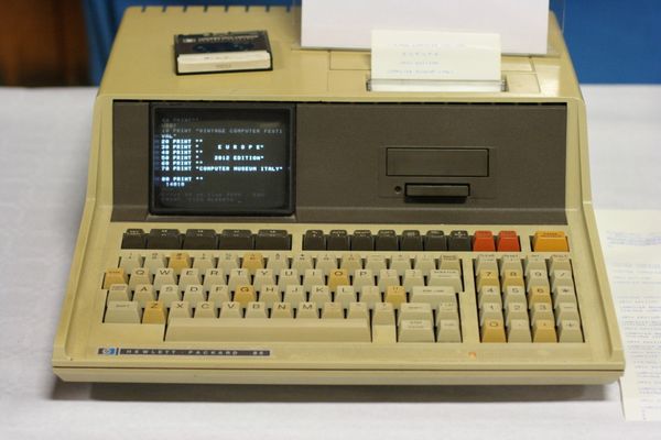 "Running HP 85 with BASIC listing, 2012" by Wolfgang Stief from Tittmoning, Germany - HP 85 (1980). Licensed under CC BY 2.0 via Wikimedia Commons.