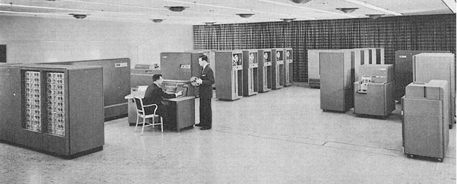 "BRL61-IBM 702" by User RTC on en.wikipedia A THIRD SURVEY OF DOMESTIC ELECTRONIC DIGITAL COMPUTING SYSTEMS from the BRL at Aberdeen Proving Ground.. Licensed under Public domain via Wikimedia Commons.