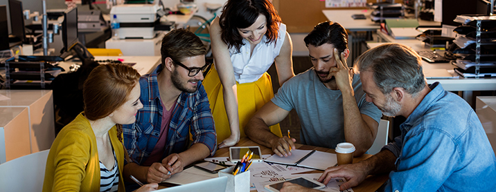 Team of designers brainstorming their new website's UI