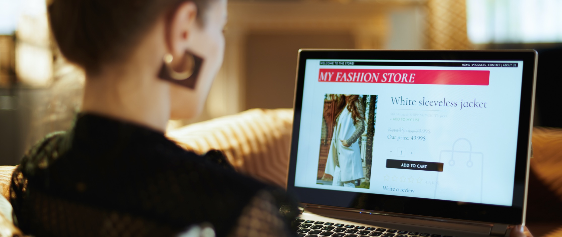 Young woman shopping on laptop