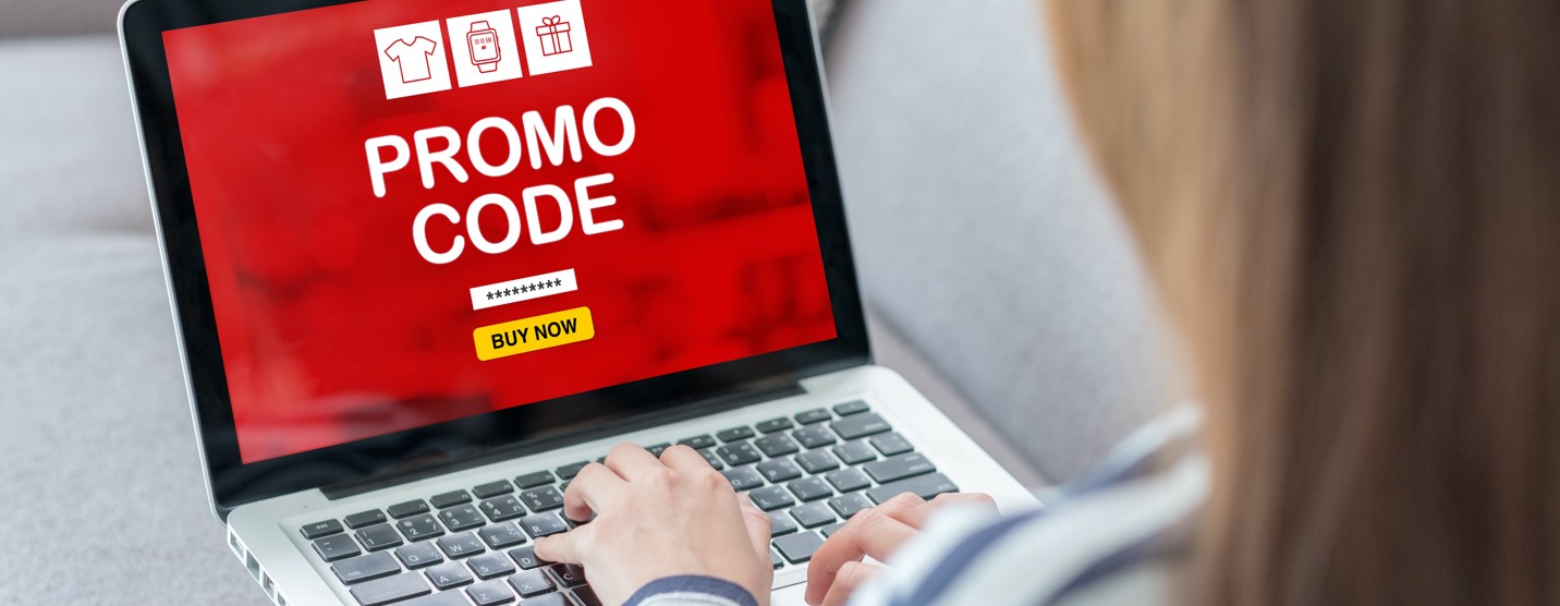 Young woman browsing an eCommerce website and receiving a promo code