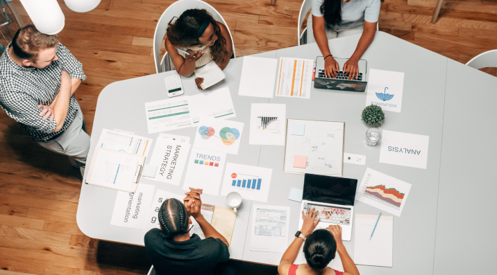 Group of professionals brainstorming in a conference room