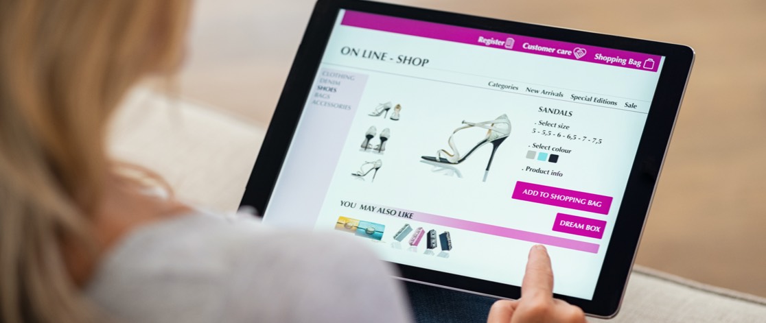 Young woman shopping for shoes on eCommerce website