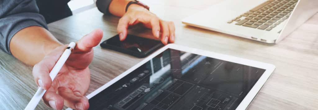 Man checking web analytics on iPad