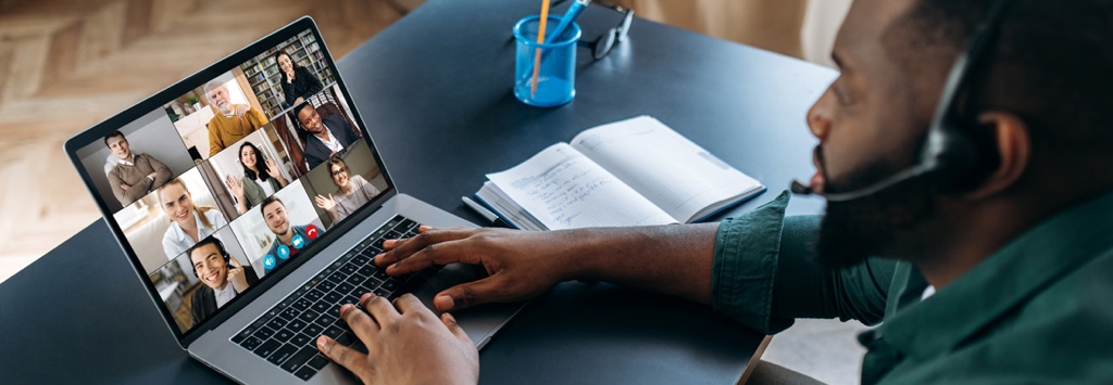 Young man working from home on a video conference call