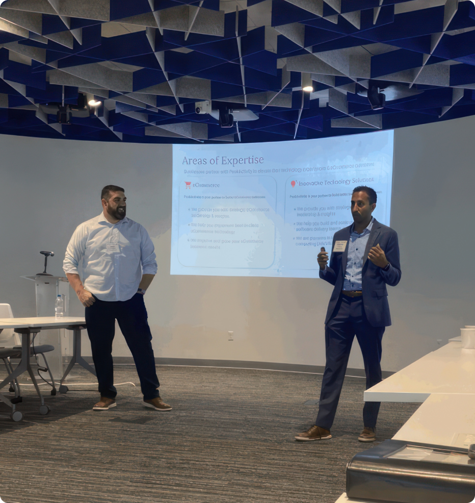 Rob Petrosino and Manish Hirapara speaking at an AI workshop Rob Petrosino and Manish Hirapara speaking at an AI workshop