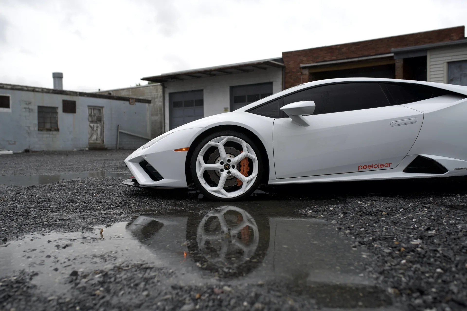 Peelclear on a white sports car