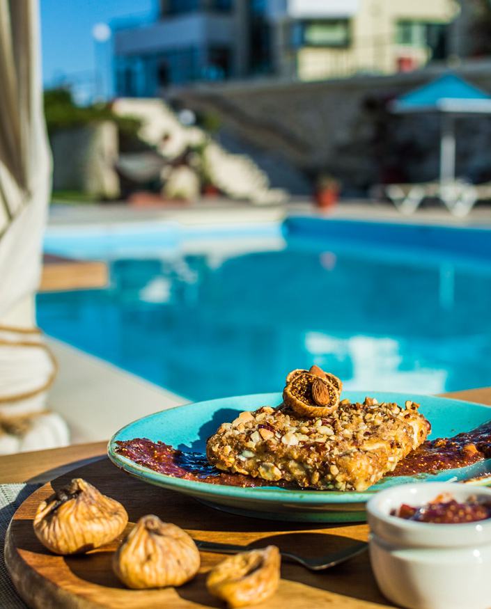 Breakfast by the swimming pool at Pela Mare Hotel