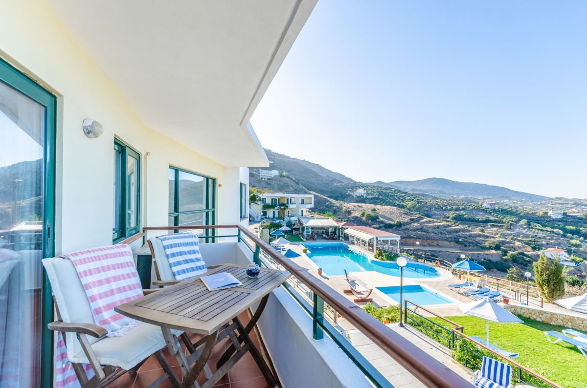 The view to the swimming pool from Deluxe Suite at Pela Mare Hotel