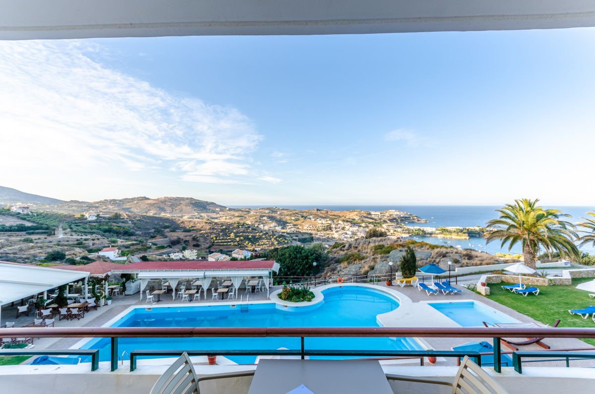 The view to the swimming pool from the Family room at Pela Mare Hotel