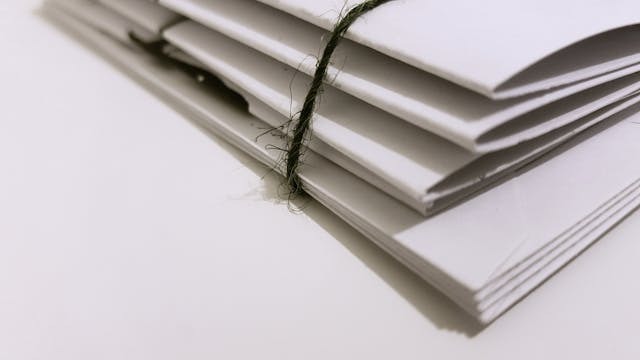 Paper Folders with a black string