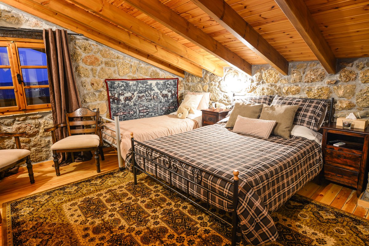 A double and a single bed at the triple room