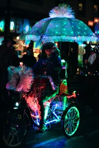 Photograph: Glowing Umbrella Night Ride