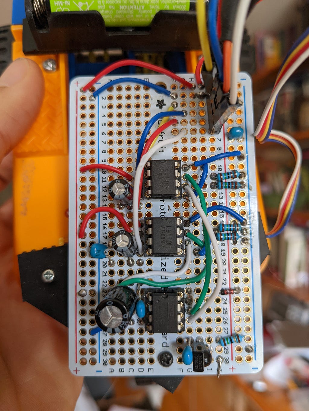 The top two ICs are L911DH (H-bridges) and the ATTiny85 is at the bottom.