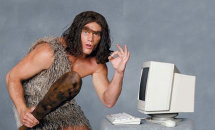 caveman with computer