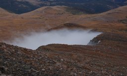 Slope of James Peak shrouded in cloud