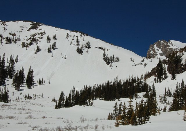 Spring snow running down Niwot Ridge