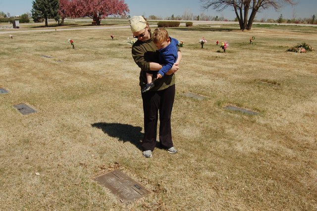 Calvin and Kiesa at the Tramblie gravesite