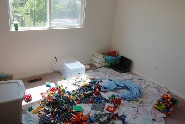 Calvin's room, mid-move, strewn with Duplos