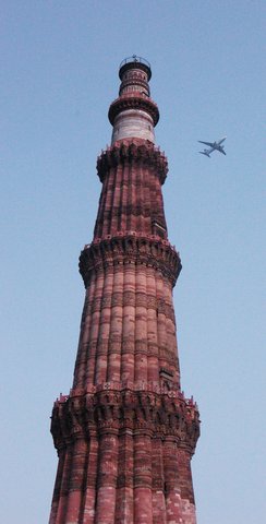 Qtub Minar and jet landing at Delhi