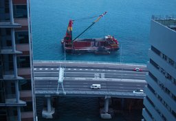 Barge dredging the harbor from our hotel window