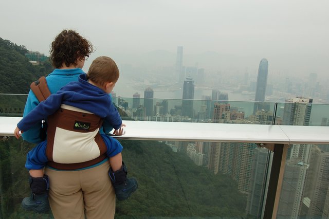 Kiesa and Calvin look out at Central from The Peak