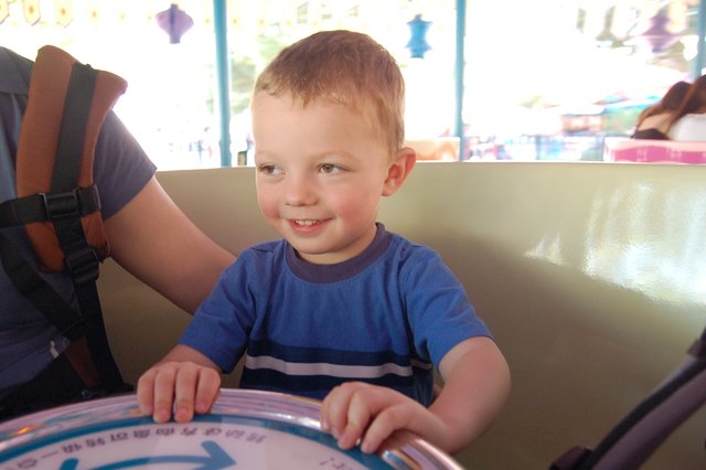 Calvin rides the spinning teacups