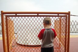 Calvin watches the harbor recede from the stern of the Staten Island Ferry