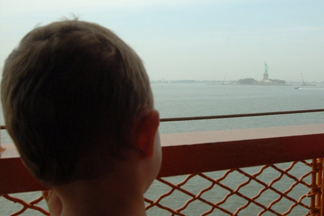 Calvin watches the Statue of Liberty