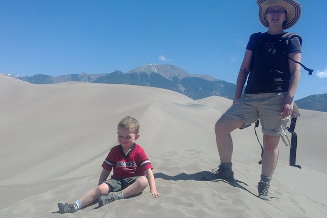 Calvin and Kiesa on top of a dune