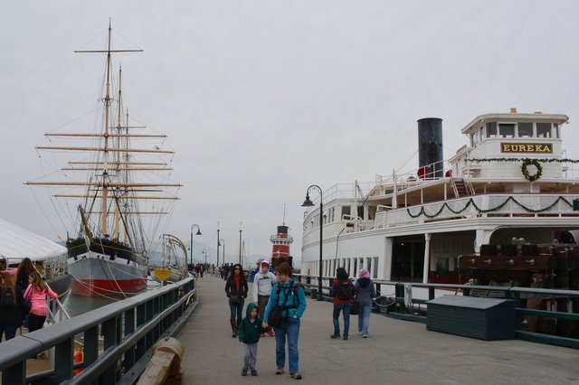 Calvin and Kiesa walk down Hyde St. Pier