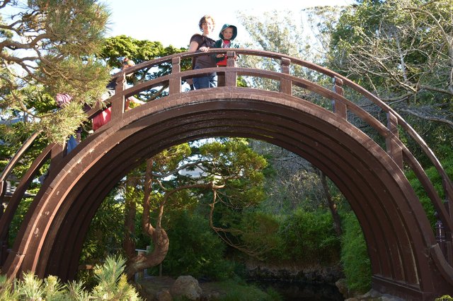 Kiesa and Calvin at the moon bridge at the Japanese Tea Garden