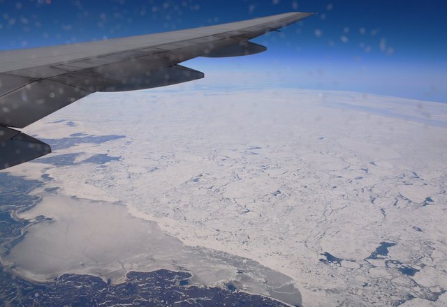 Sea ice and the coast of Newfoundland and Labrador under G-YMMB's wing