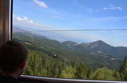 Calvin watches the scenery from the Pikes Peak Cog Railway