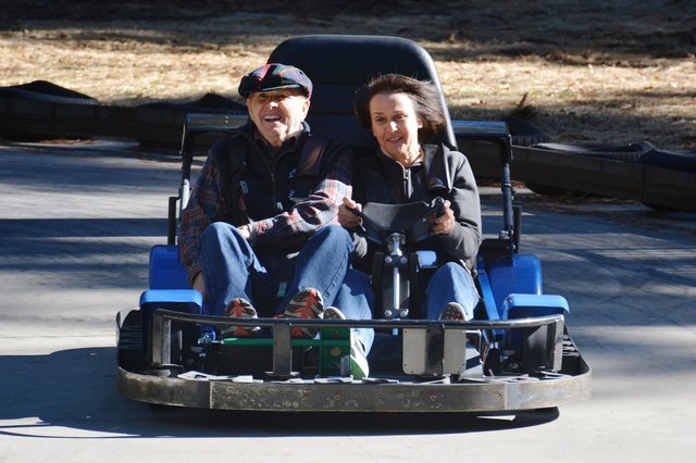 Mom drives a go-kart with Grandpa Logan