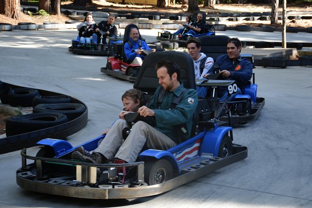 Calvin rides go-karts with Uncle Willy